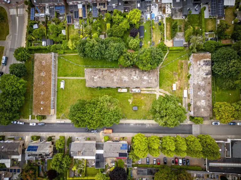 Aerial view of green residential area.